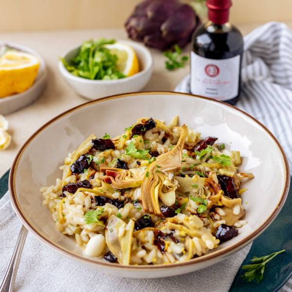 Risotto al Parmigiano Reggiano e carciofi con bacon stufato all'Aceto Balsamico Invecchiato Sigillo Bordeaux
